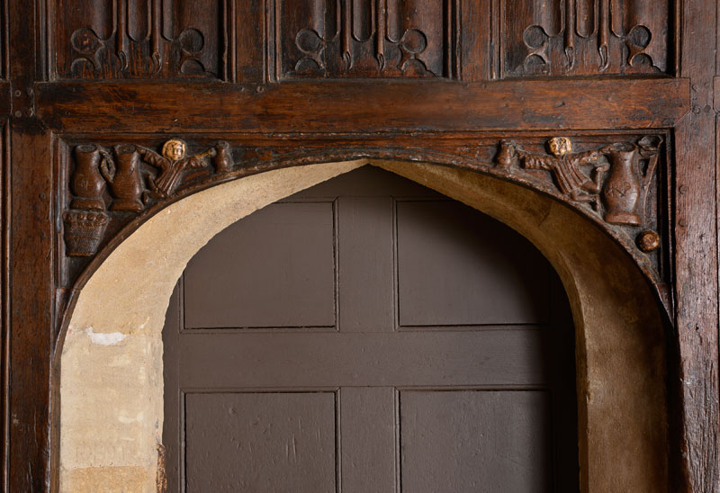 Hall Boy Carvings over the Buttery Door