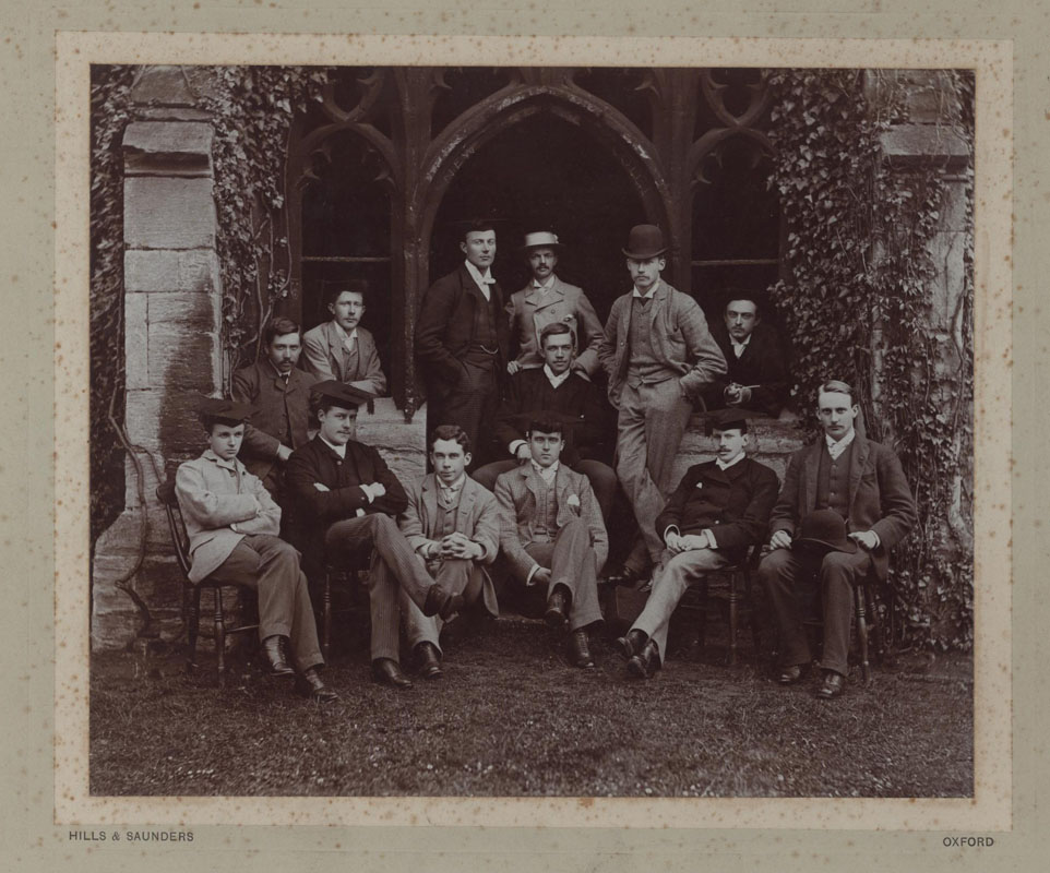 NCA JCR/Q2/3, Photograph of New College Essay Society members, including Herbert A.L. Fisher (back row, in subfusc), Lionel Pigot Johnson, celebrated 1890s poet (front row, first on the left), and Campbell Dodgson, future Keeper of Prints & Drawings at the British Museum and son-in-law of Warden Spooner (front row, third from left), 1888
