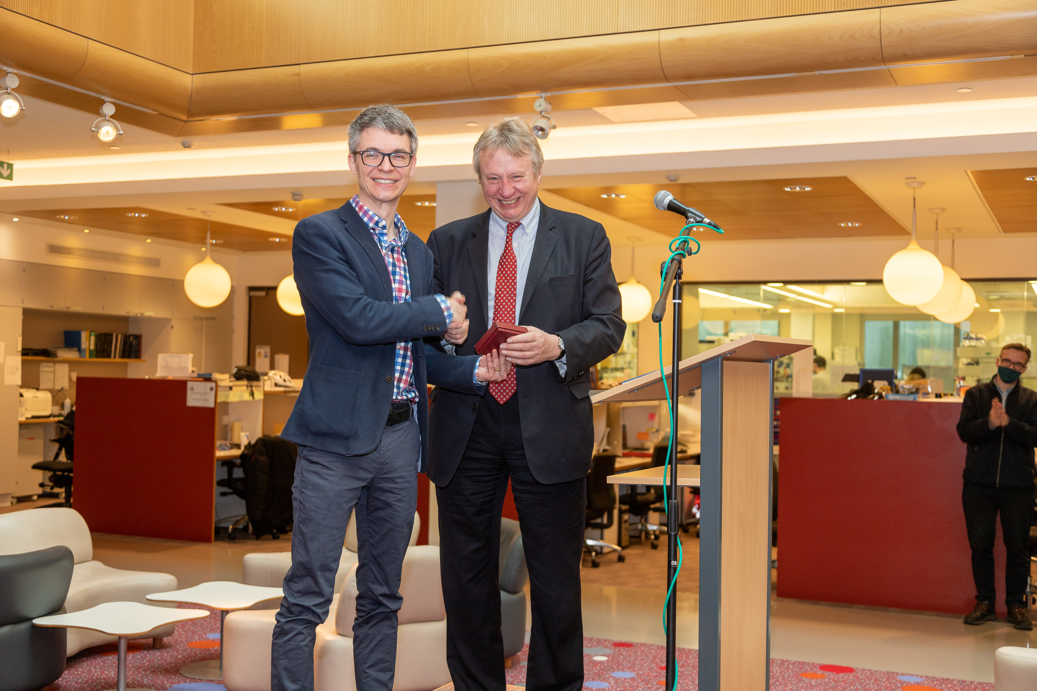 Stephan Uphoff receives his prize from Sir Alex Markham