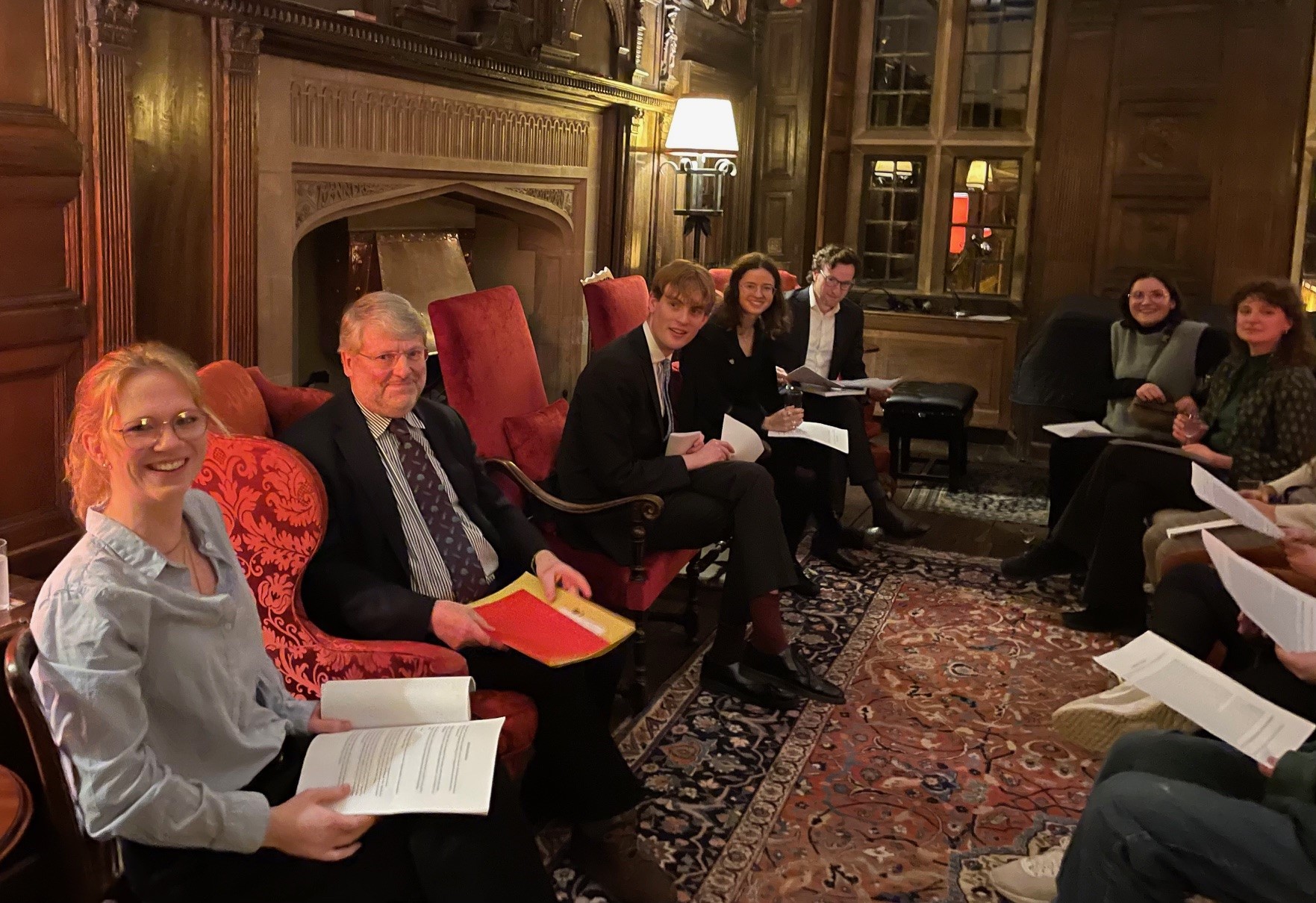 Speakers gather in the Warden's Lodgings for Hilary Term's New College Essay Society's meeting