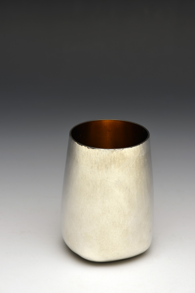 Water beaker by Angela Cork: made of Britannia Silver in a soft satin finish and commissioned in 2013 Water beaker by Angela Cork: made of Britannia Silver in a soft satin finish and commissioned in 2013