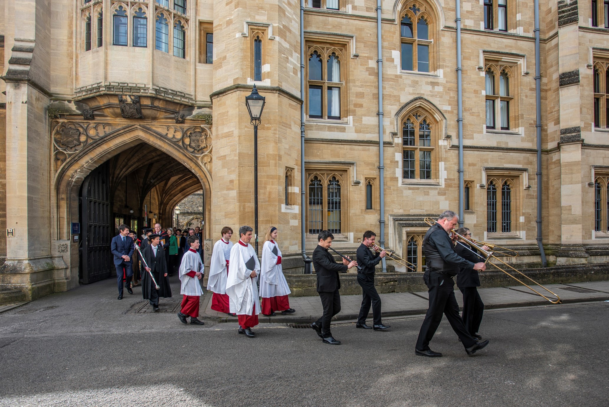 The procession leaves New College's main site on Holywell Street