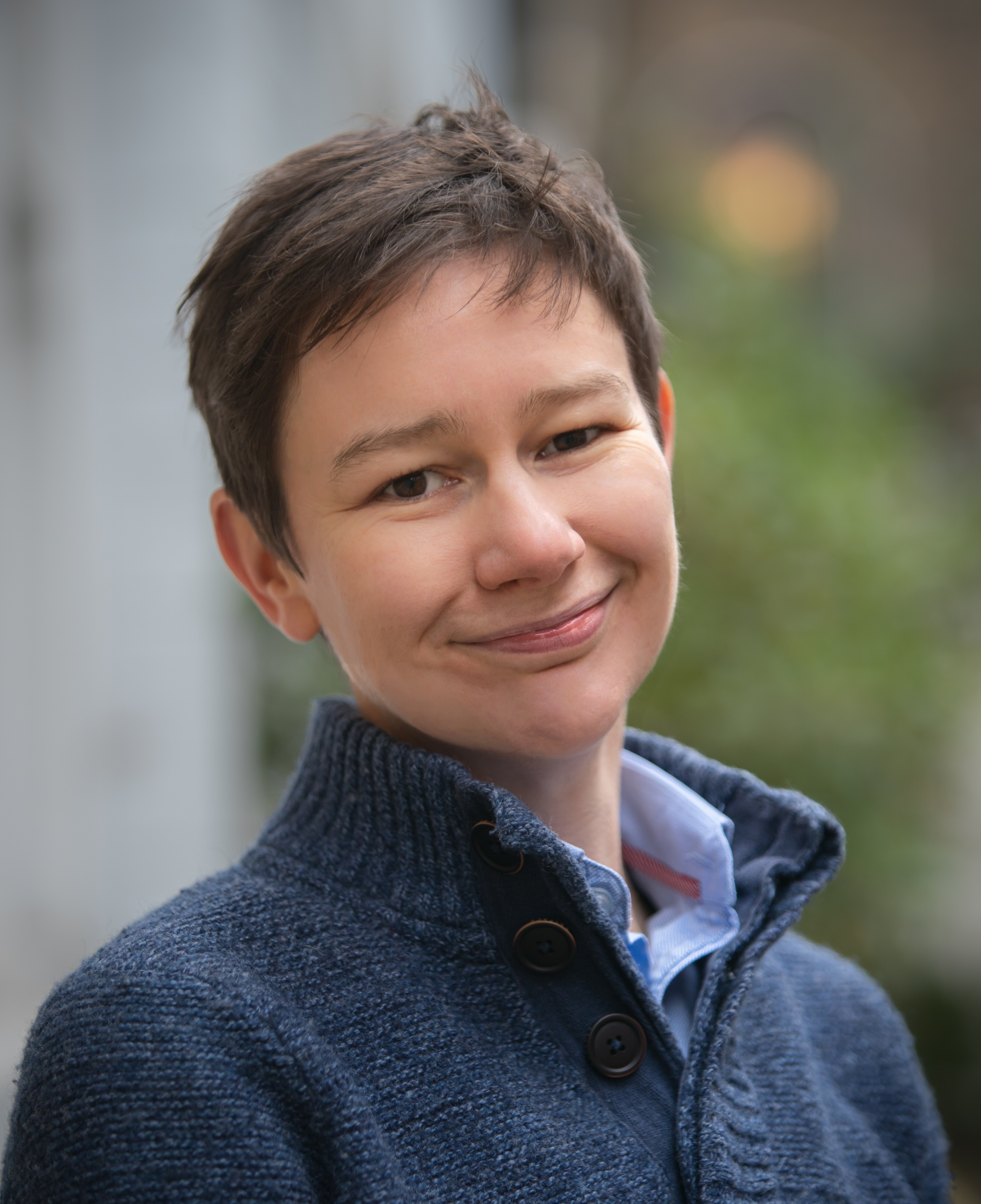 Colour photo of Katy Hamilton smiling at the camera