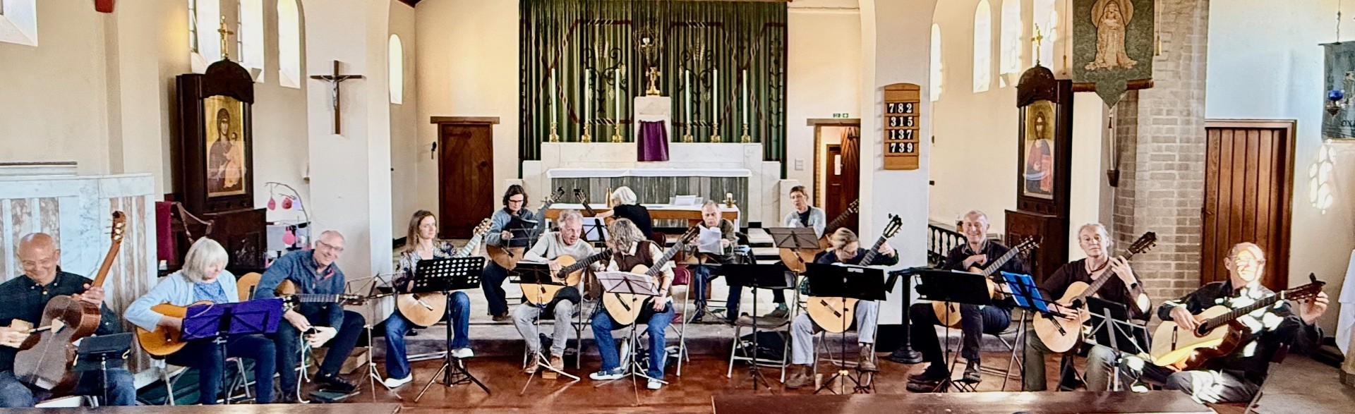 The New Oxford Guitar Ensemble rehearsing in a church