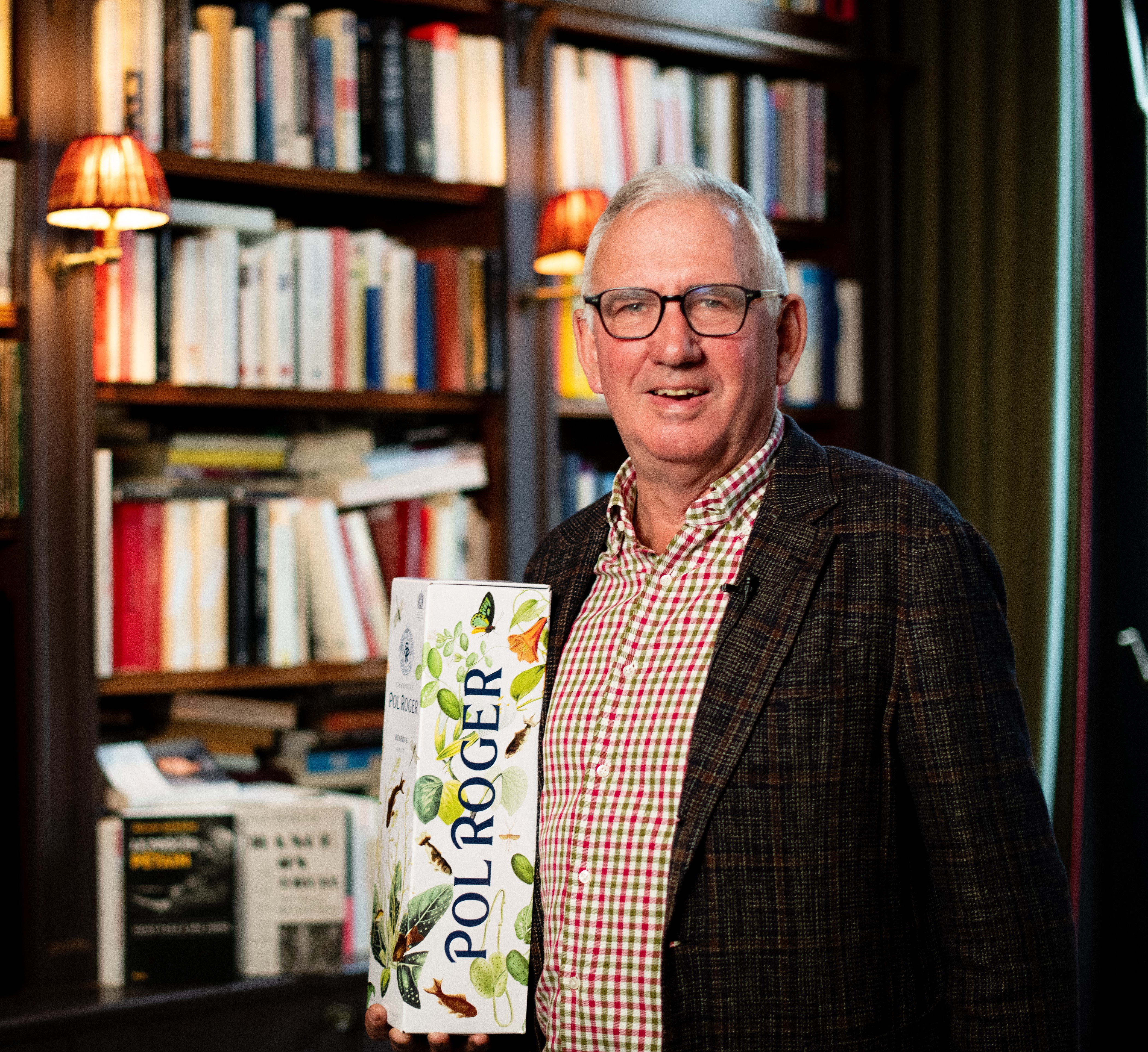 Julian Jackson with a bottle of Pol Roger