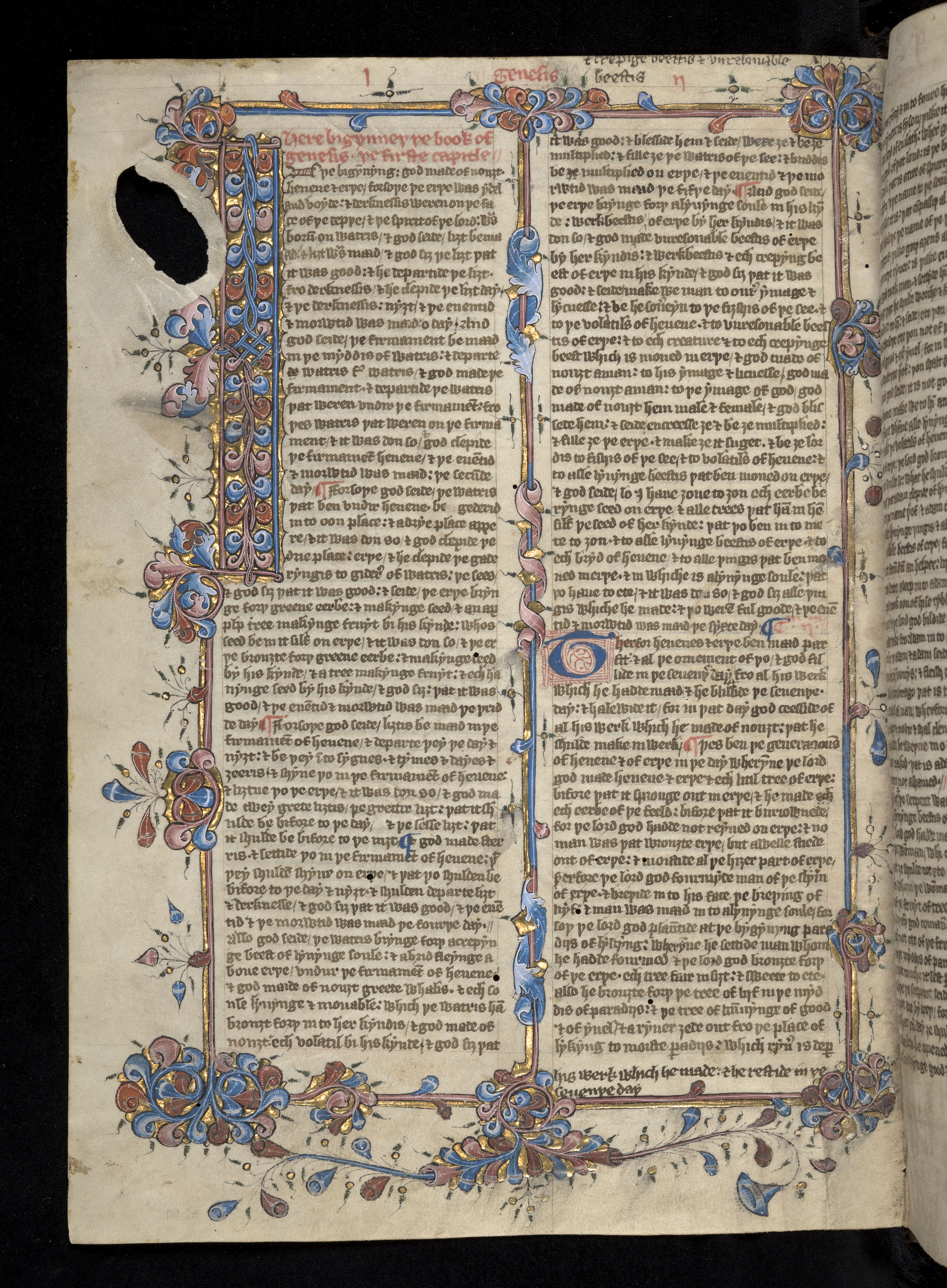 A picture of a manuscript with a large initial I decorated with blue and pink swirls on a background of gold.