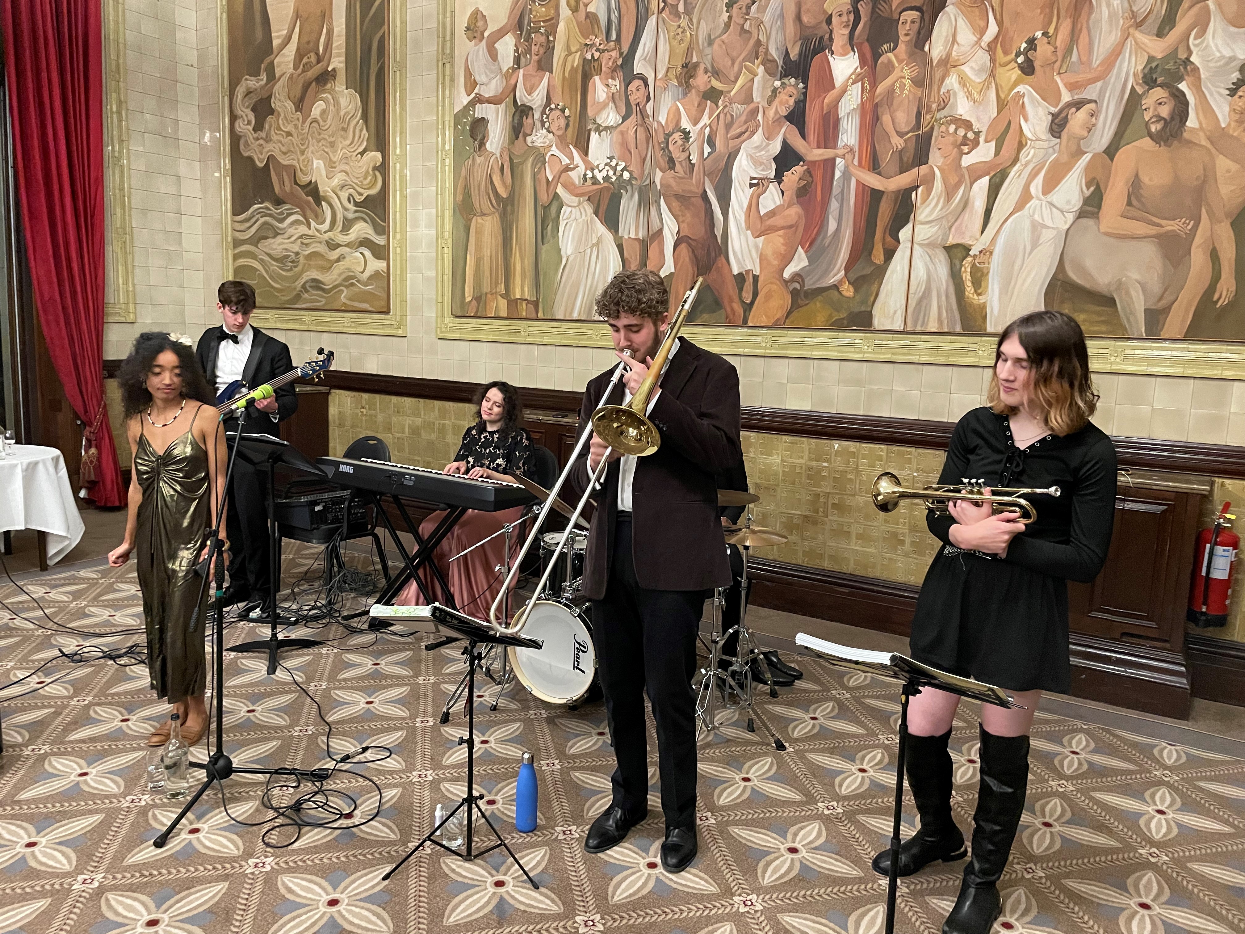 The Green Bean Machine band playing instruments