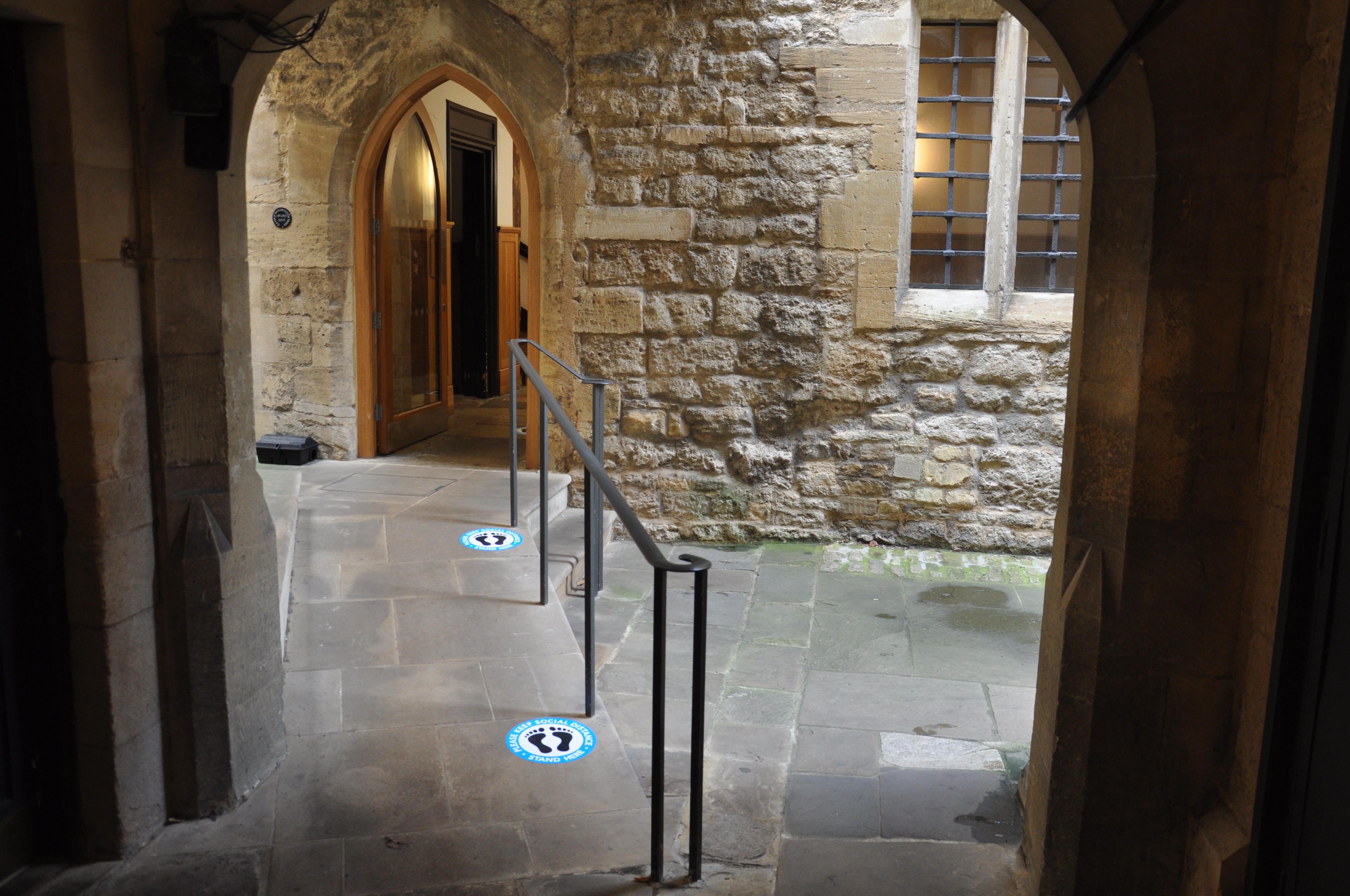 Entrance to Hall with social distancing markers on the floor