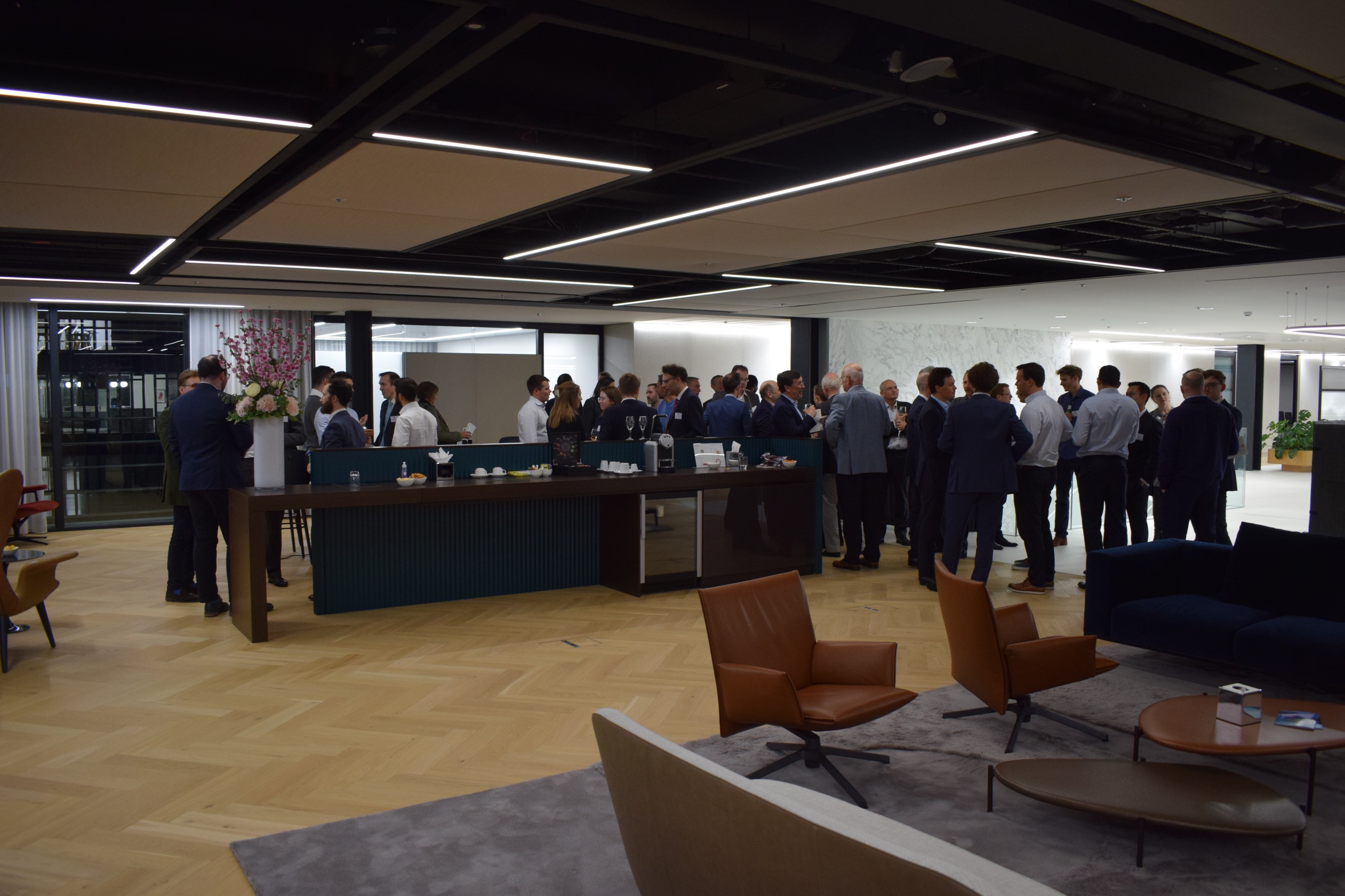 Old Members gathering and talking with drinks