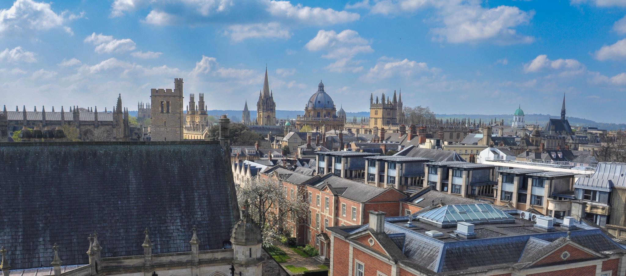A view of the Oxford skyline with blue sky