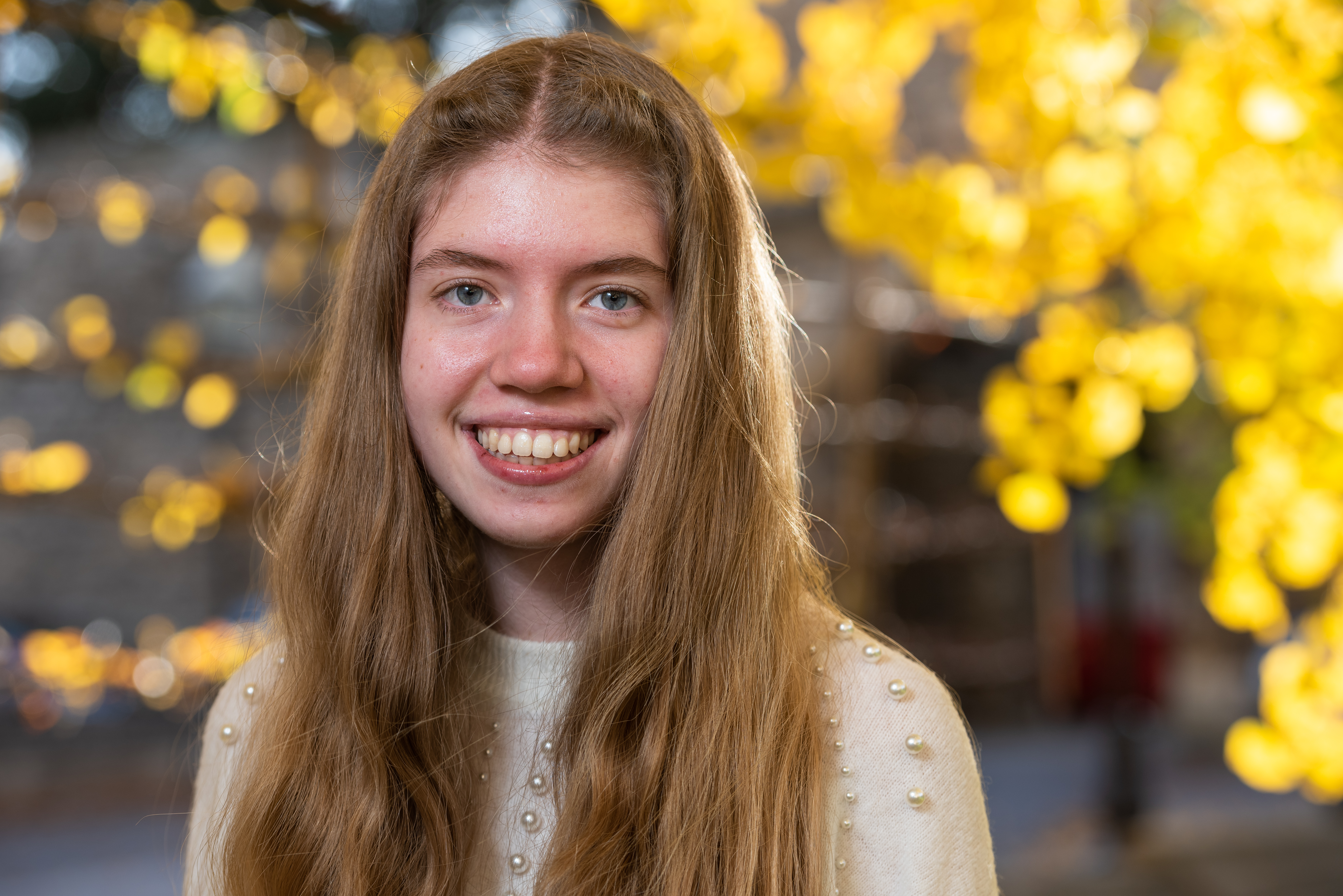 A smiling New College student