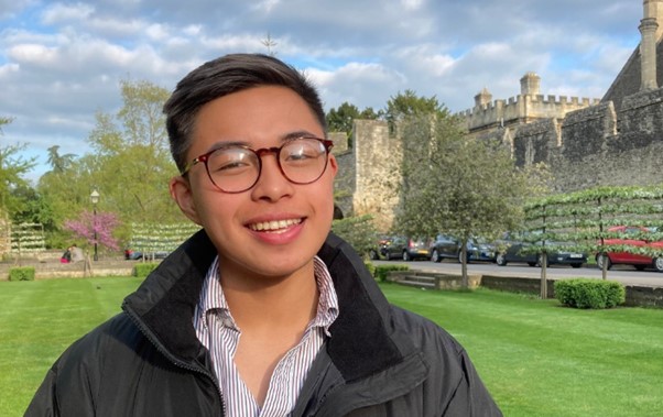Gabriel with a lawn and medieval city wall behind