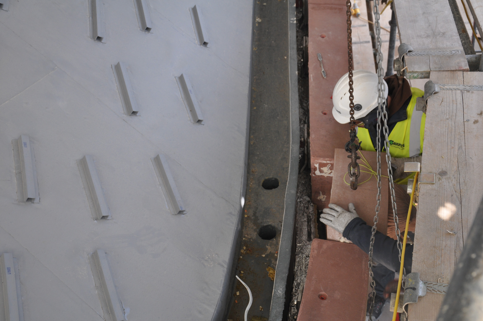 Gargoyle is lowered into place