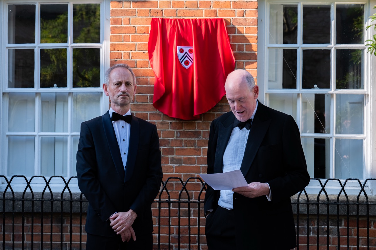 His Excellency and the Warden in front of the plaque