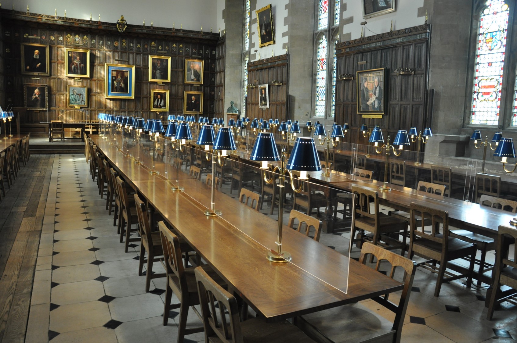 Dining Hall with plastic screens dividing the tables