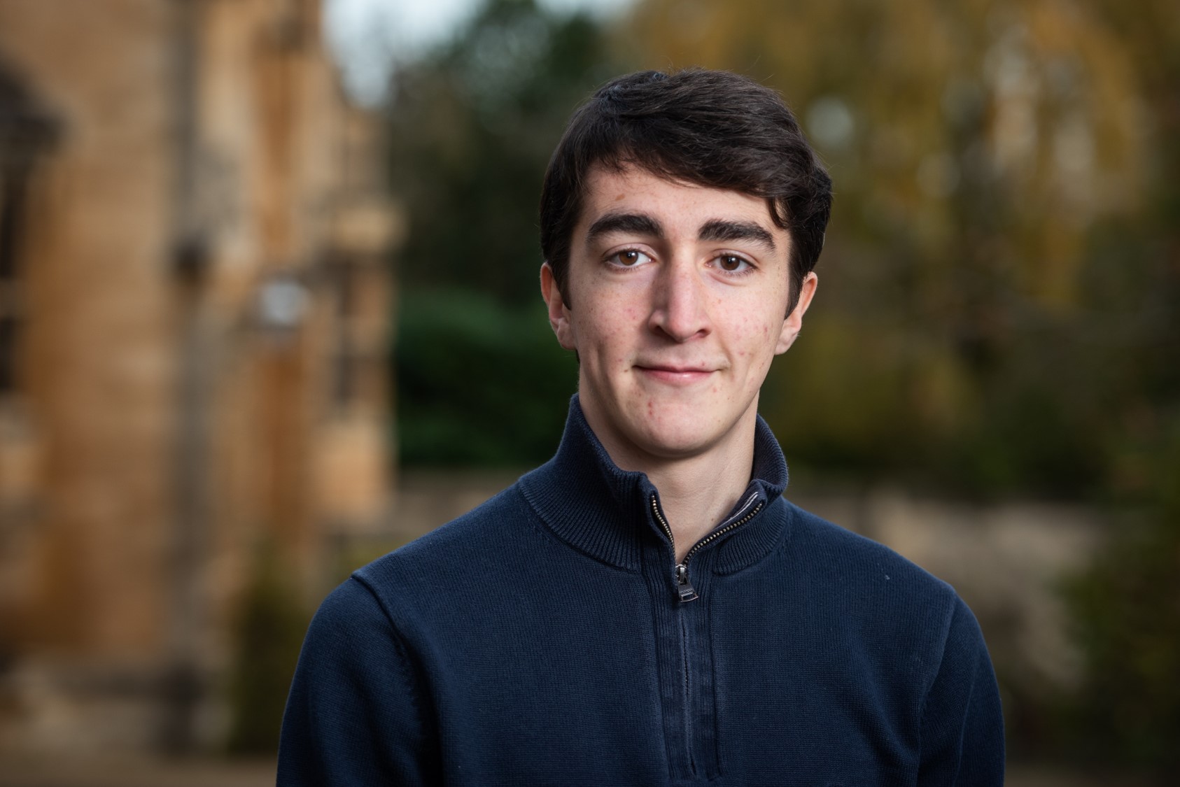 A smiling New College student