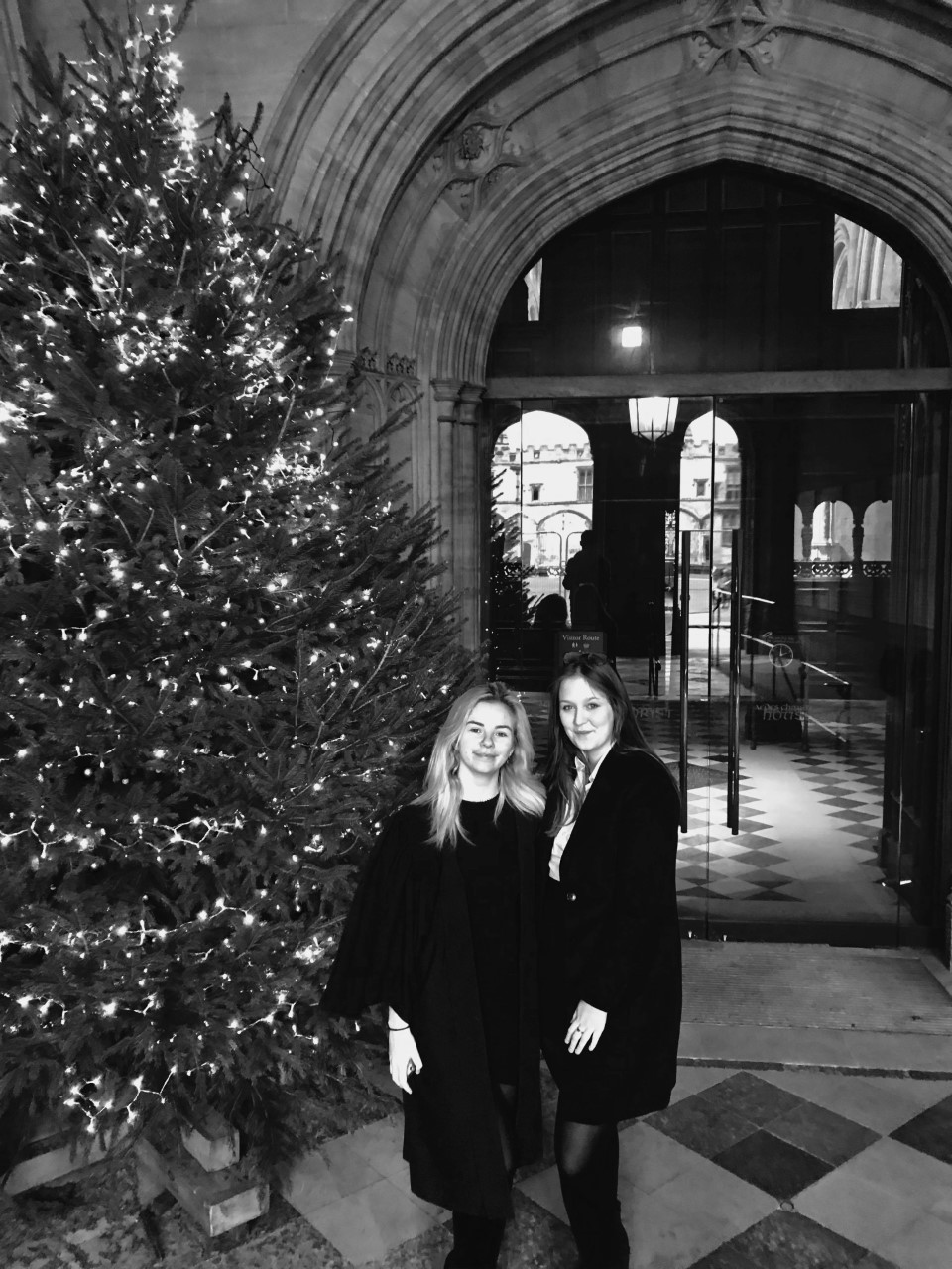 Beth Arrowsmith and Ruth Flame standing next to a Christmas tree