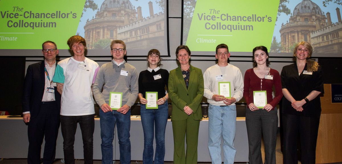 The winners receiving their award with the Vice-Chancellor