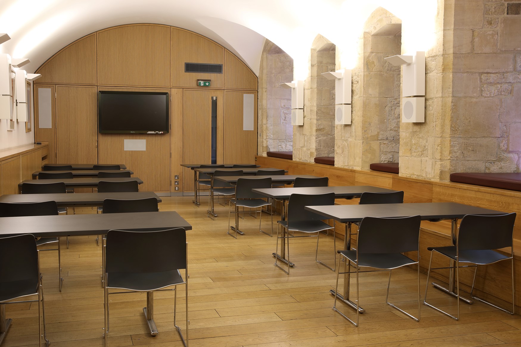 The North Undercroft - a smaller room with 10 desks and two black chairs per desk