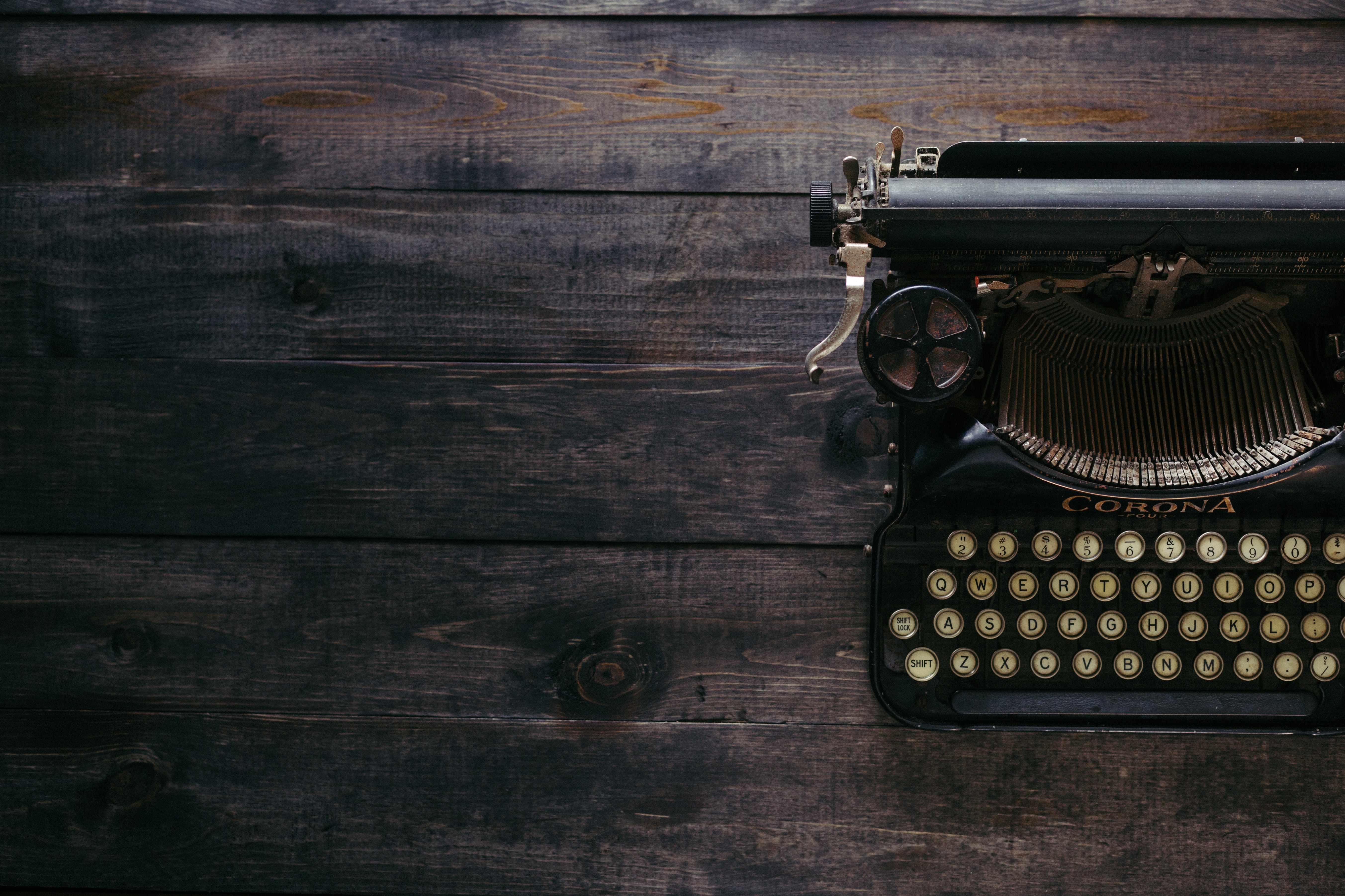 Typewriter on wooden desk