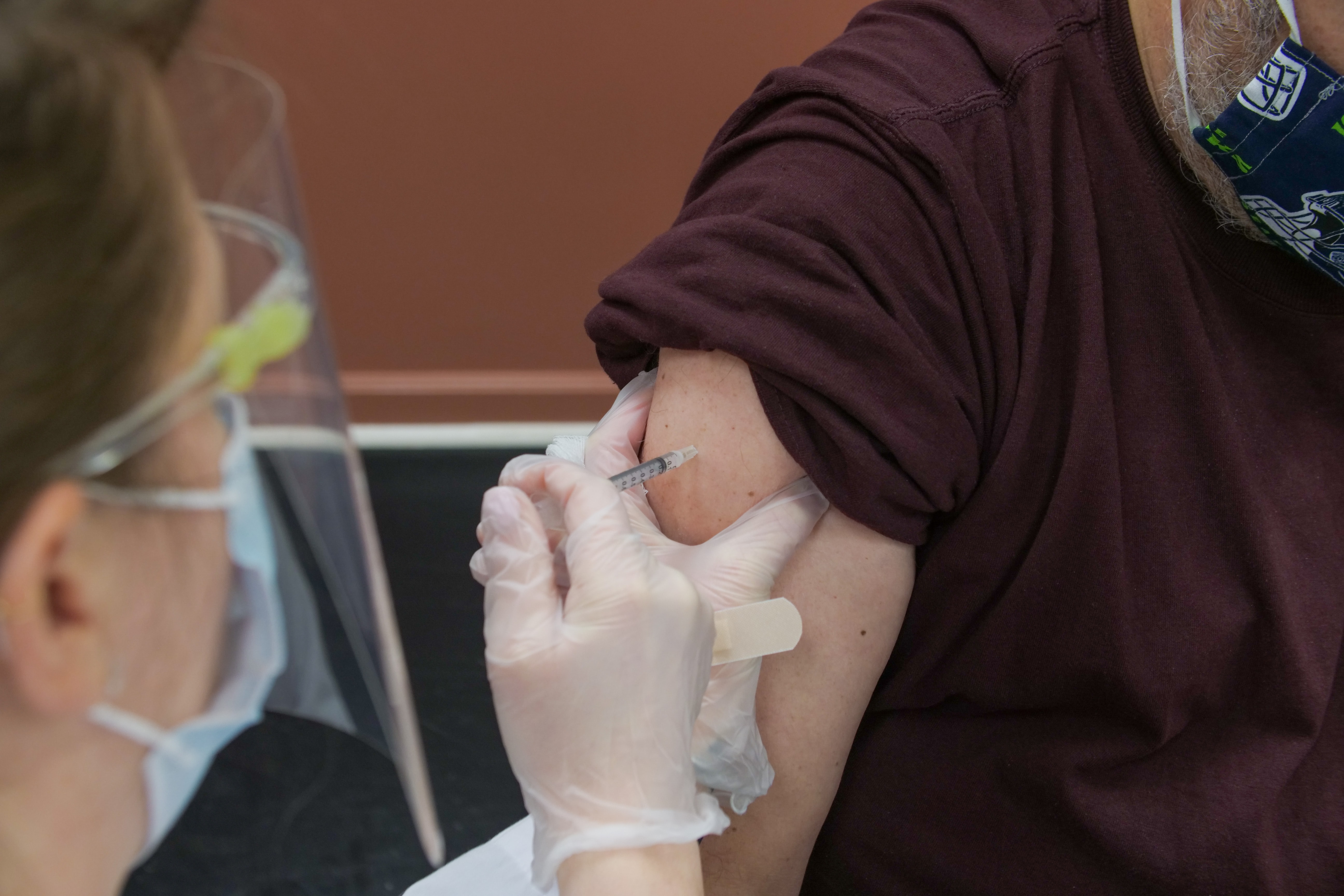 Patient receiving vaccine injection