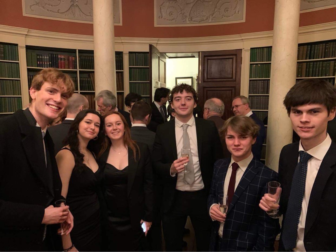 James and 5 History students gather before the talk