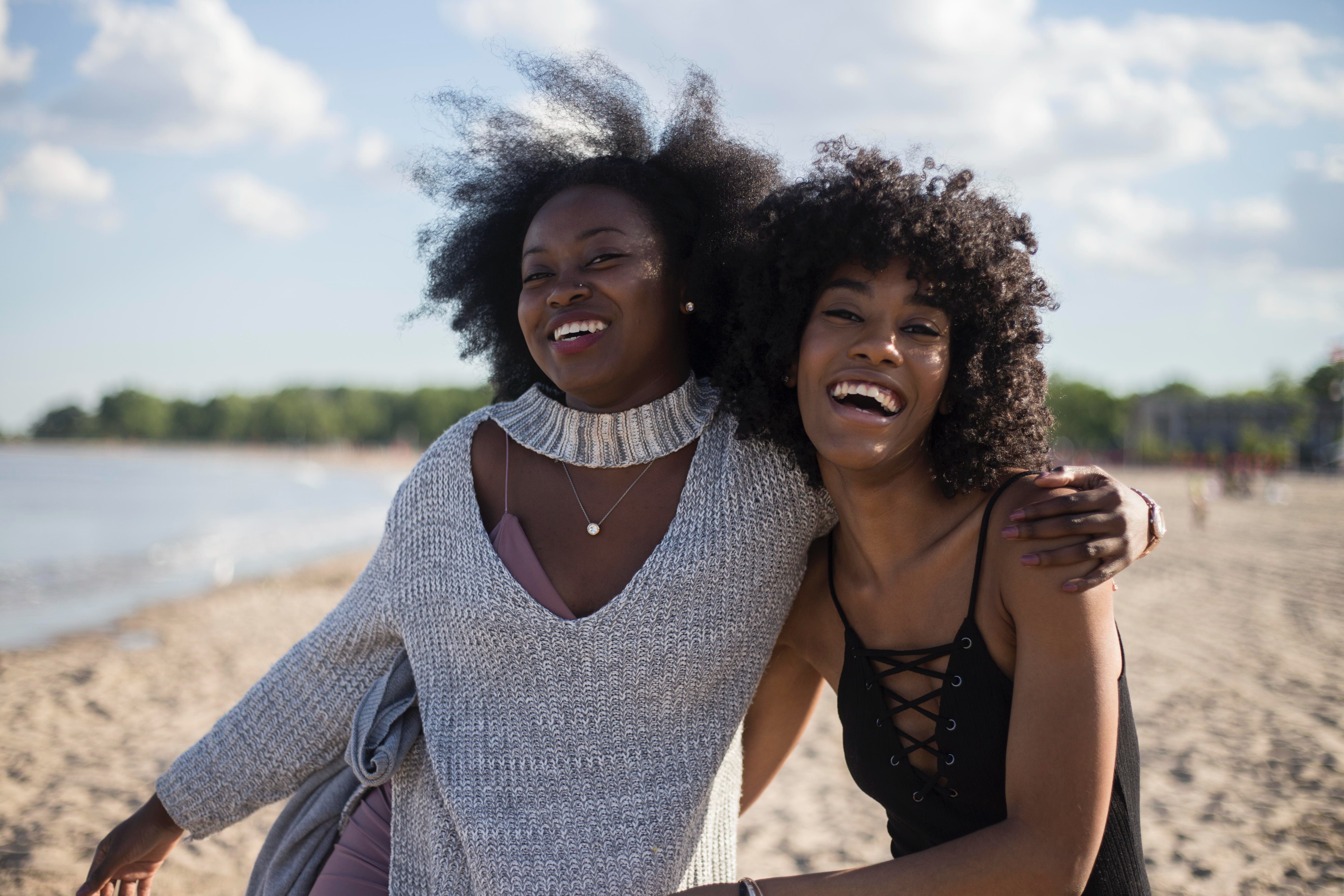 Two women laughing together