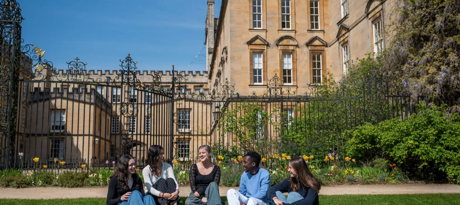 A group of students sat in the garden.