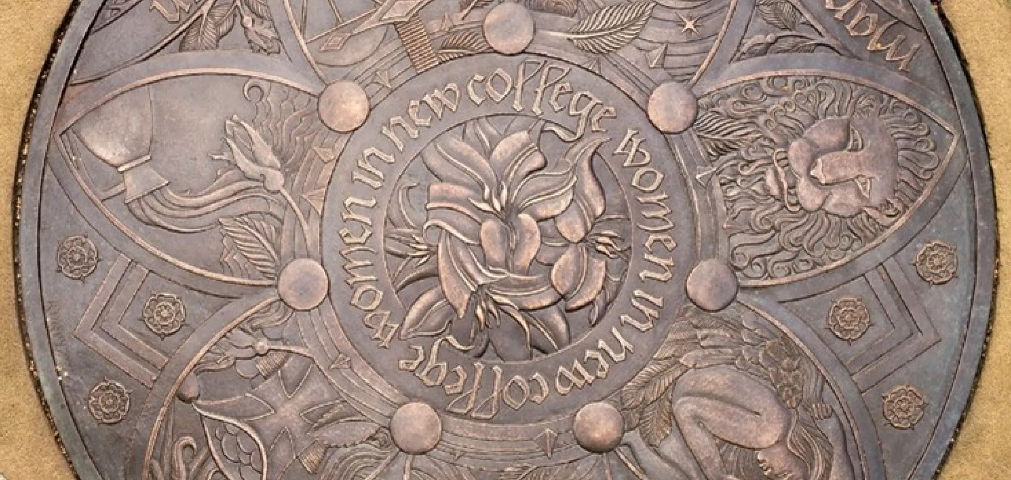 Plaque commemorating admission of women as students at New College.