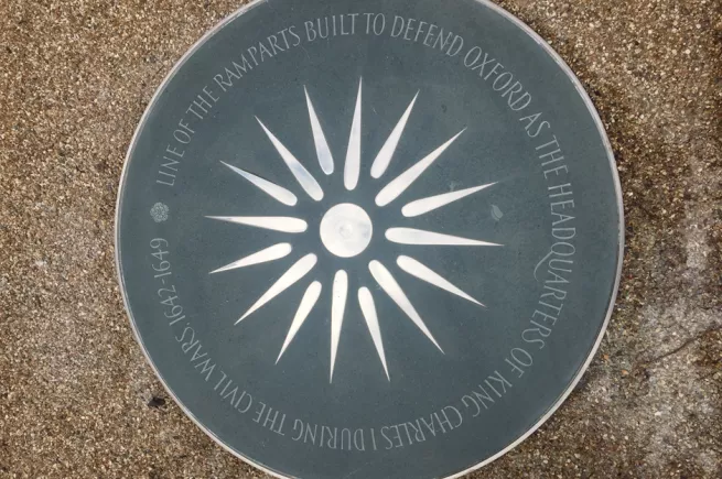 Plaque outside the Clore Music Studios, indicating the line of the Civil War fortifications of Oxford