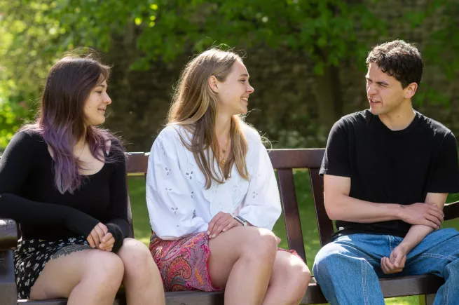 students on a bench