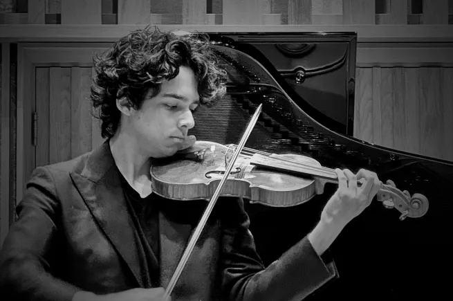 George Lawson playing the violin