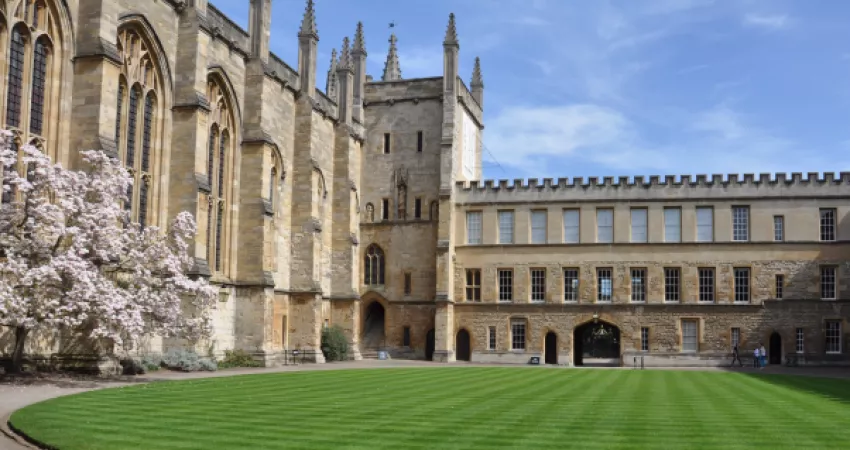 Front Quad, with the Gothic architecture of the Hall, Muniment Tower, and the oval lawn