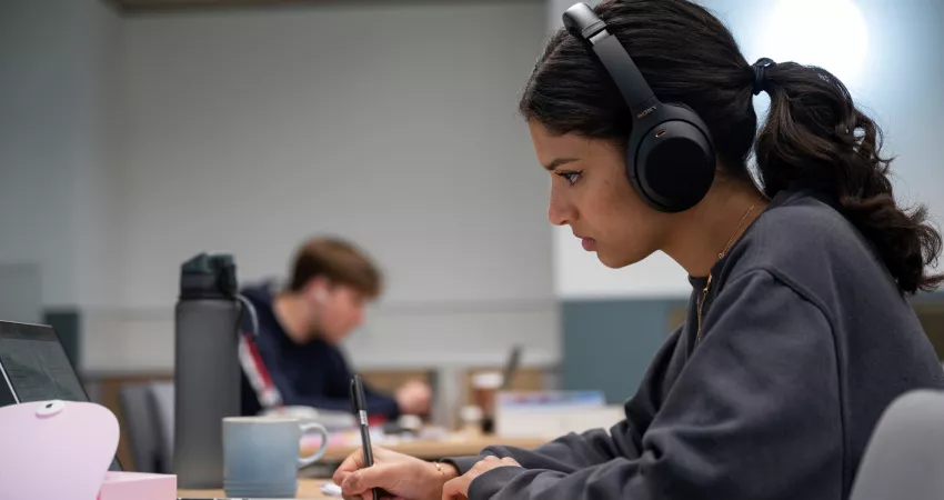 A student working in the Gradel study space