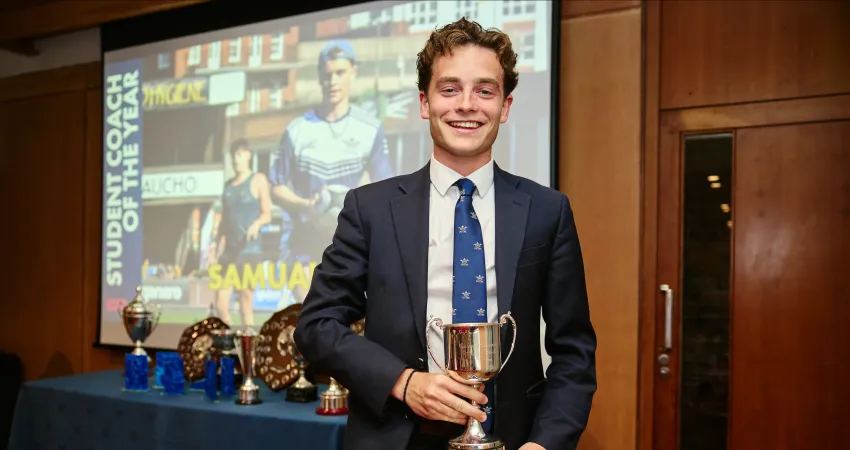 Samuel Thompson holding trophy