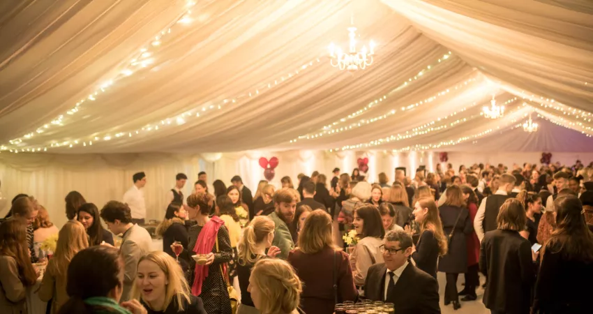 The marquee full of guests socialising