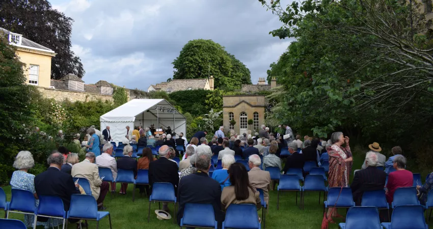 Audience gathering in the Warden's Garden