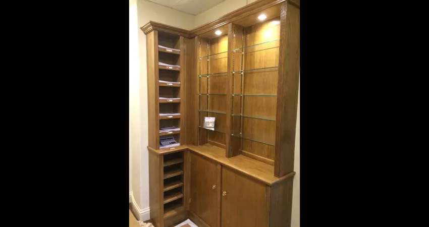 Wooden cupboard with lights and shelves