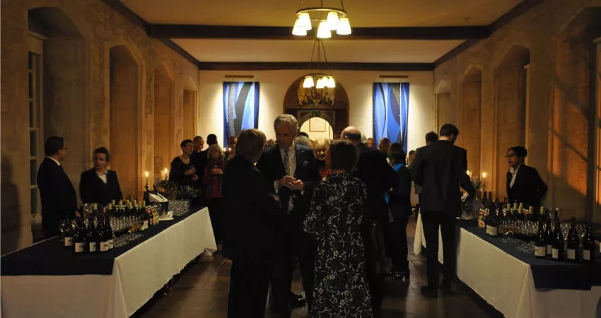 Attendees at the drinks reception in the Founder's Library
