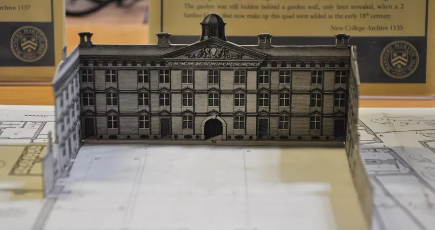 A pop-up Georgian building on an old document