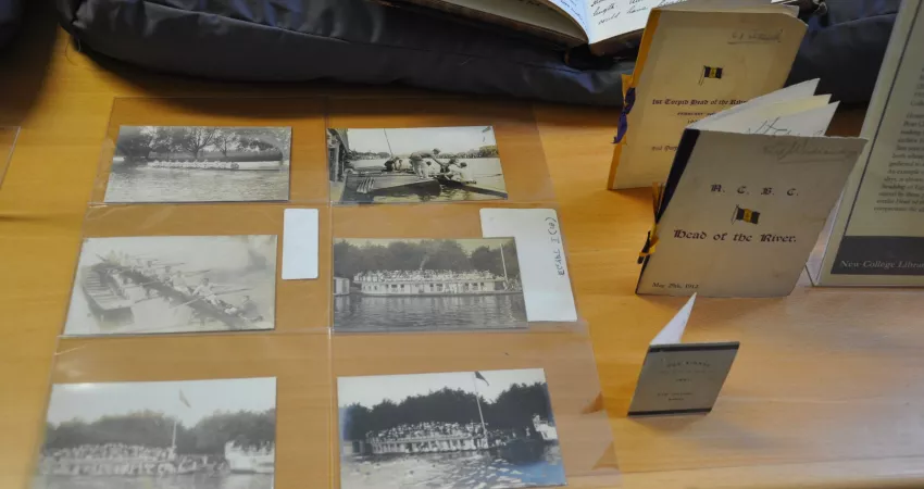 Old photographs featuring rowing; menus for celebratory dinners