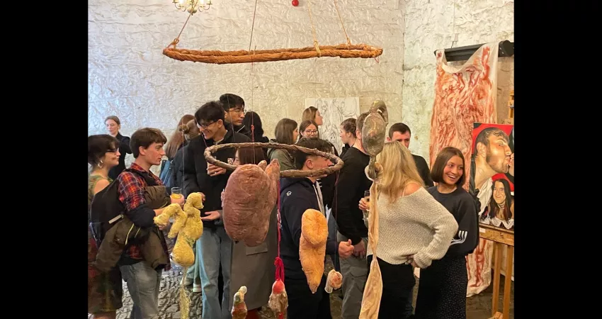 Students looking around an art exhibition