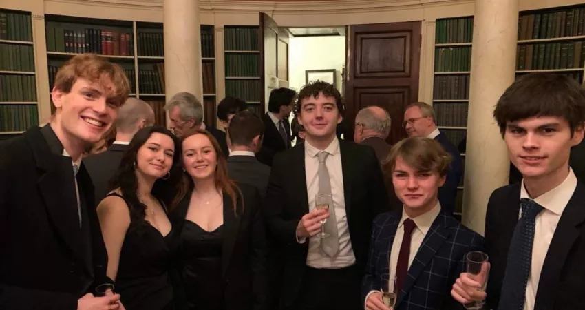 Students at the drinks reception in the McGregor Matthews Room