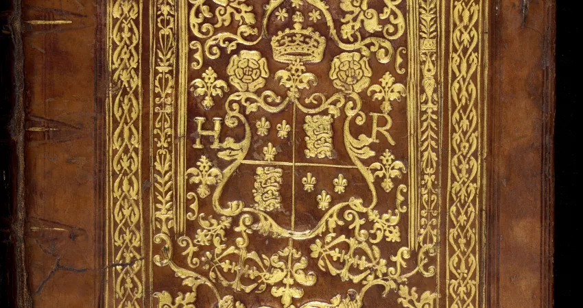 Detail of the gold-tooled binding of MS 136, showing the king’s coat of arms