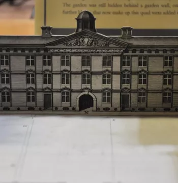 A pop-up Georgian building on an old document