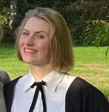 A woman smiling at the camera