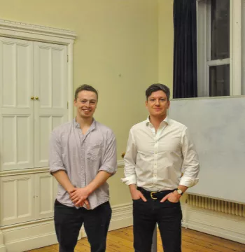 Alex Reut-Hobbs with New College's MCR President, Theo