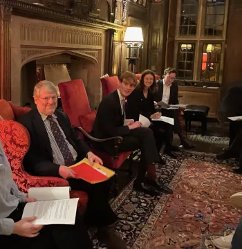 Speakers gather in the Warden's Lodgings for Hilary Term's New College Essay Society's meeting