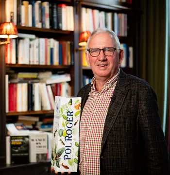 Julian Jackson with a bottle of Pol Roger