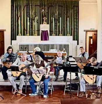 The New Oxford Guitar Ensemble rehearsing in a church